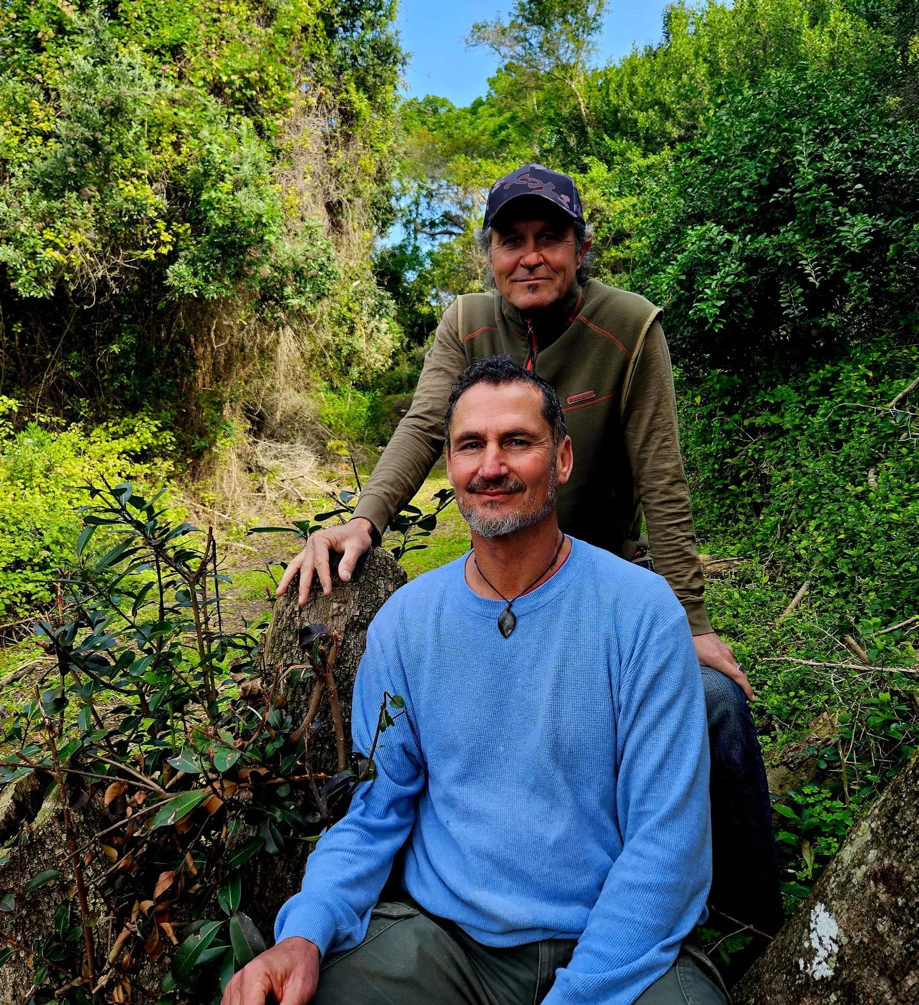 Ray Nolan and Dion Viljoen together in the forest at Well-Being Sanctuary